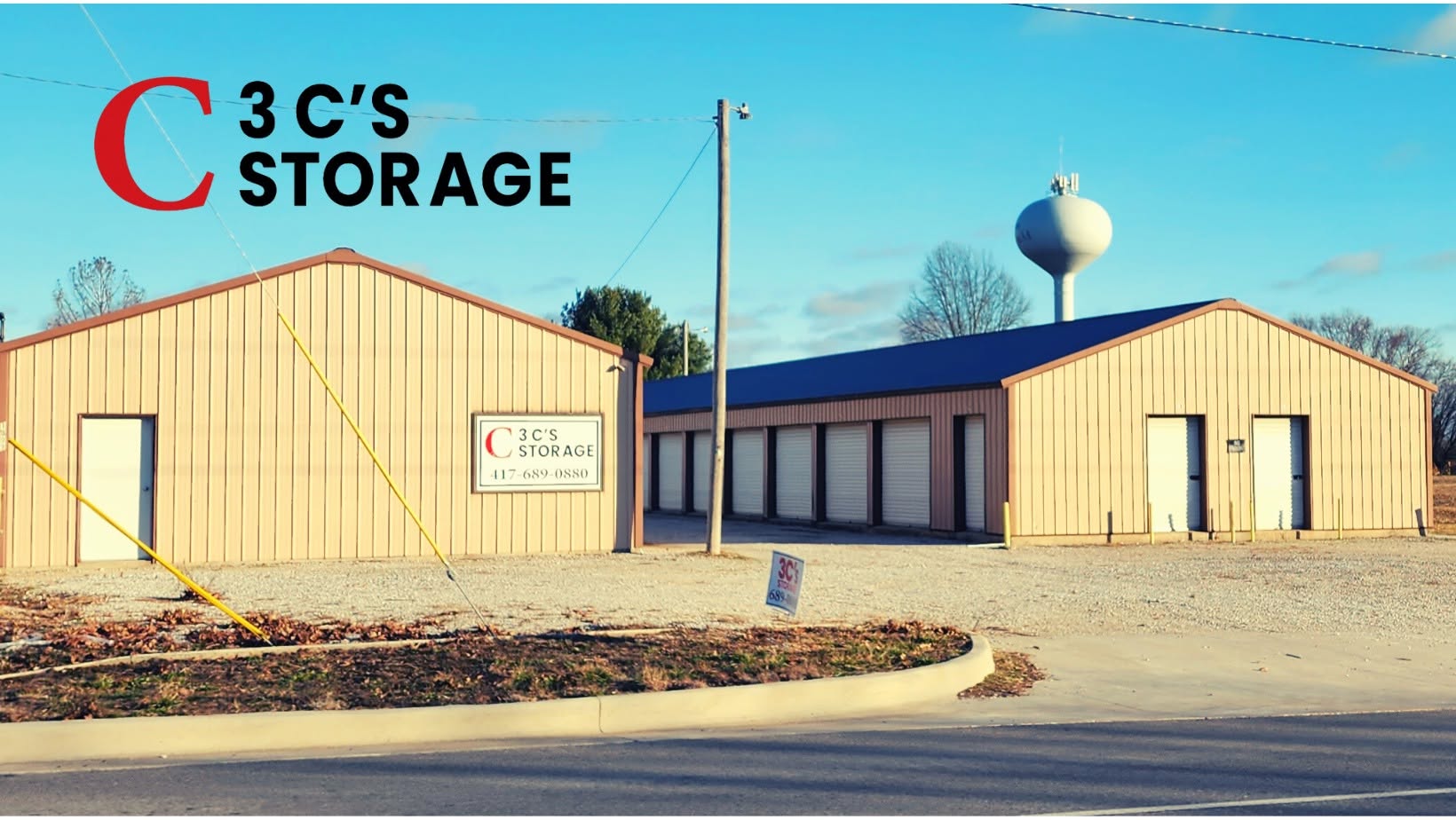 Three C Storage in Nixa with tan storage buildings, red roof trim, and the facility sign